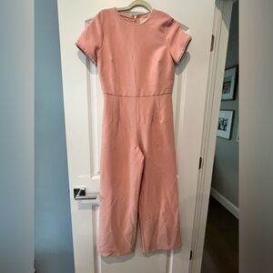 Gal Meets Glam Pink Jumpsuits with pearl bead neckline